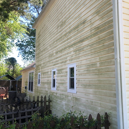 What are the signs your home exterior needs professional house washing
